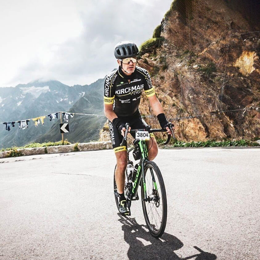 Keen employee riding a mountain bicycle